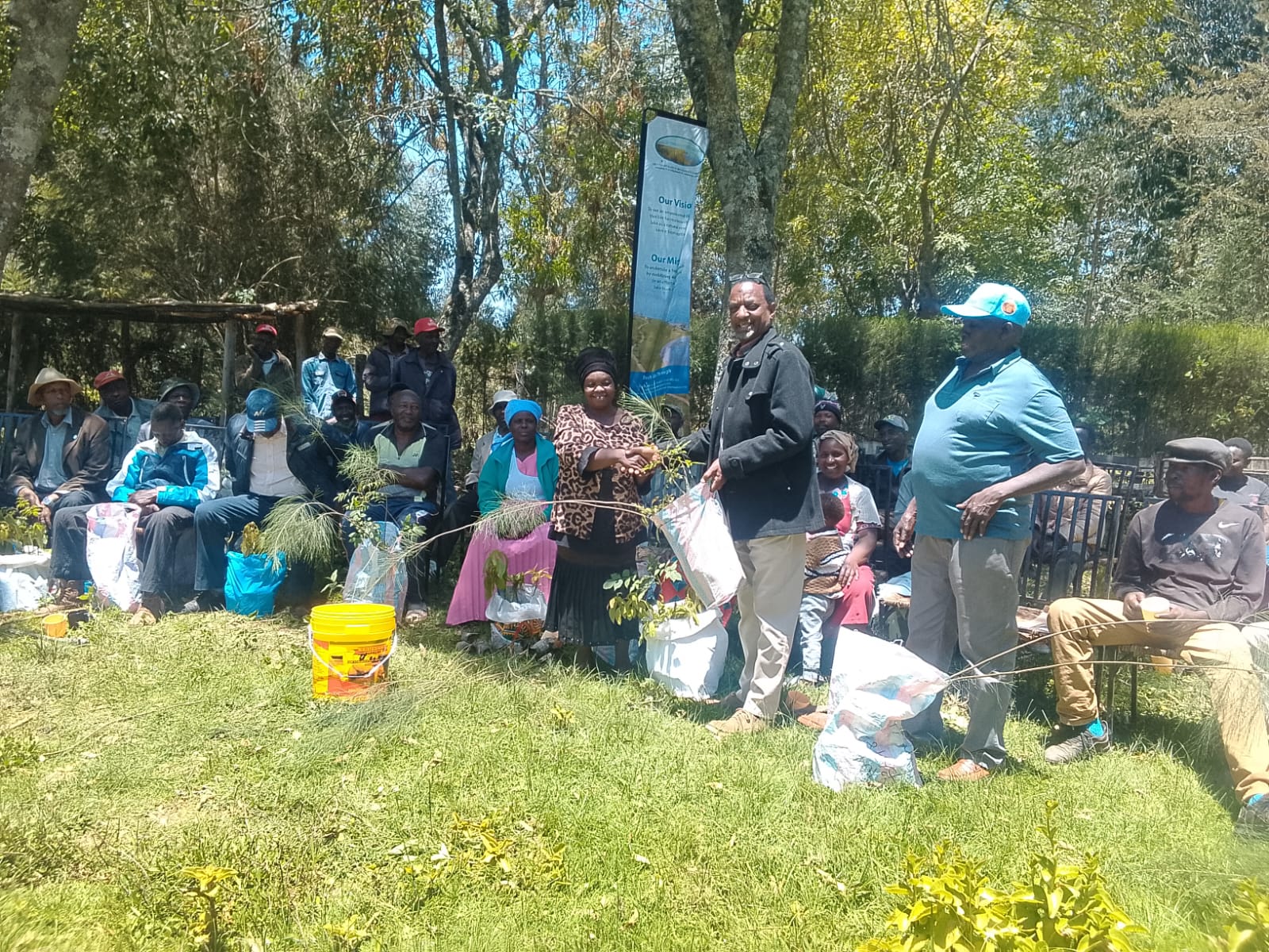 A farming household receiving seedlings